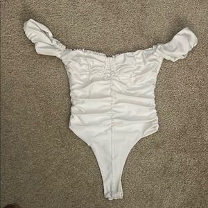 White ruched and ruffle bodysuit